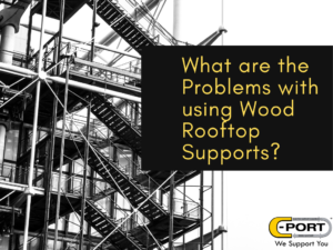 What are the problems with using wood rooftop pipe supports?