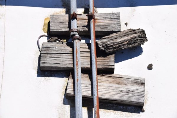 Rotting Wood pipe supports